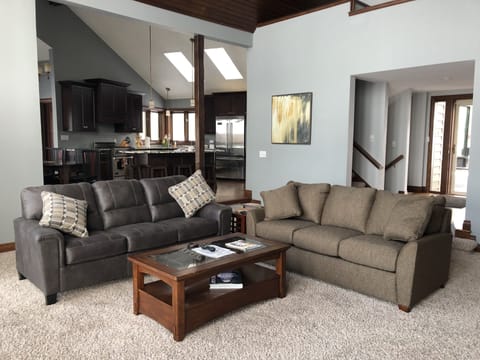 One step down to this gorgeous sunken living room.