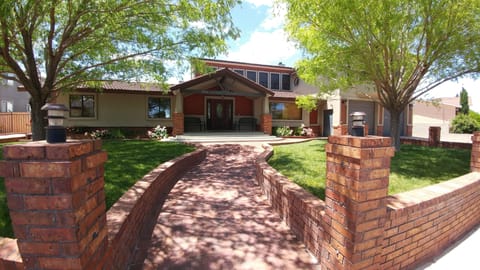 Front yard with grass and SHADE from the trees.  Very nice in the summer.