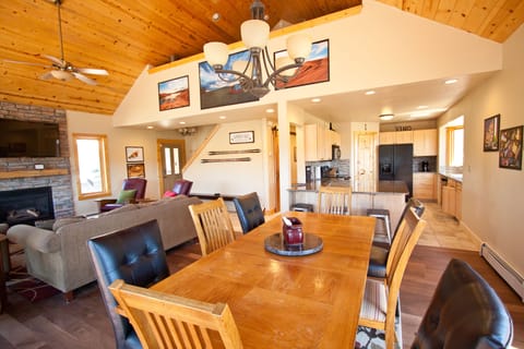 View from dining area to kitchen and loft