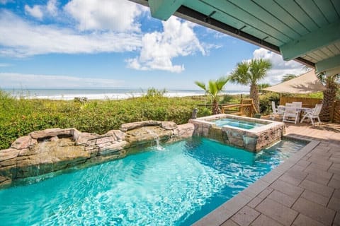Saltwater pool wt soothing sounds of waterfalls as you enjoy the ocean. breeze. 
