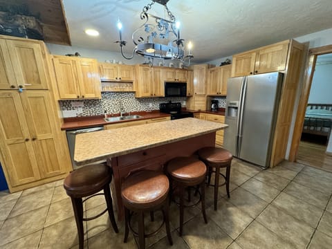 Large open kitchen with island.