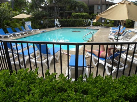 Lounge by the pool, hot tub, and sauna. Just steps away.