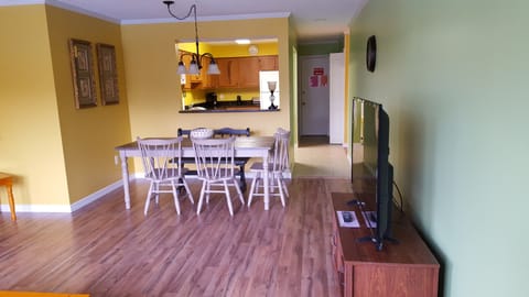 View from living area into dining/kitchen/entry hall