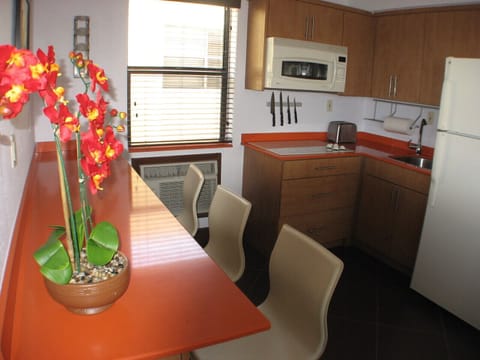 Refrigerator,Microwave,Coffee Maker, Cook-top Stove,Toaster,Dishes & Utensils