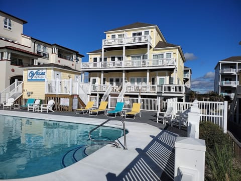 Rear of property overlooking community pool