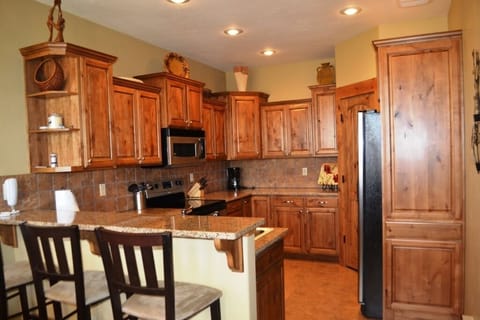KITCHEN AND BAR AREA