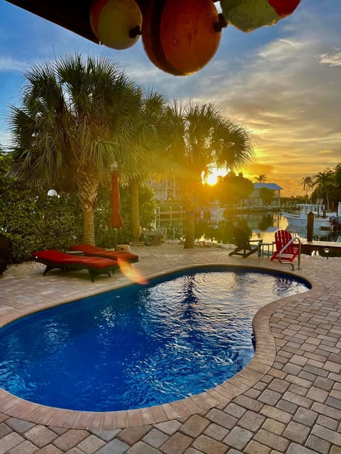 Come enjoy the pool while seeing the boat come and go down the canal. 