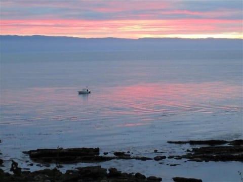 Rise early to see a spectacular sunrise - taken in front of Sea Shell