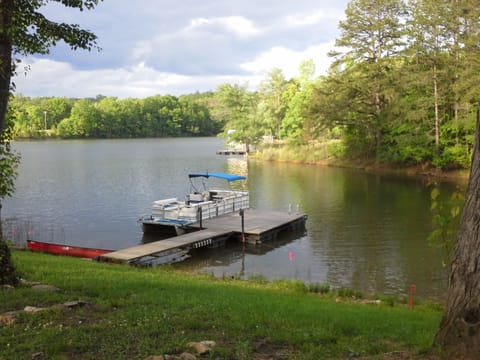 Our dock, the canoe and the pontoon boat available to rent.