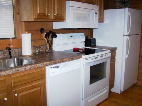 New full size appliances. Refrigerator has ice maker.