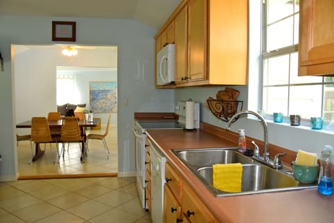 Kitchen opens to dining room.