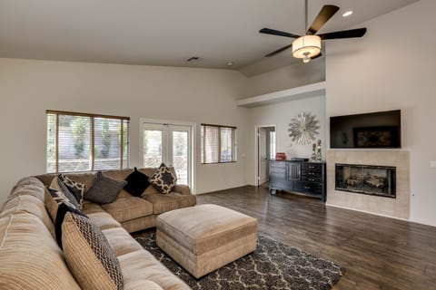 Living room space w/ wall mounted flat screen SMART TV 