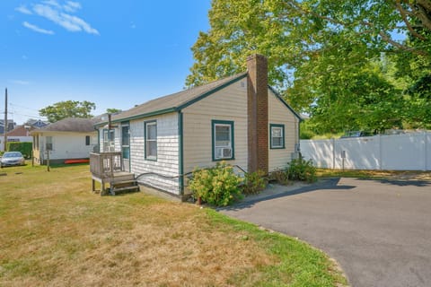 side view of cottage with small deck