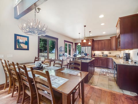 Kitchen with Door to Deck, Two Extra Chairs for Table in Master