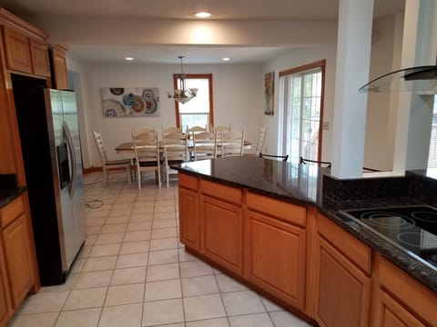 Plenty of seating with kitchen table and kitchen island