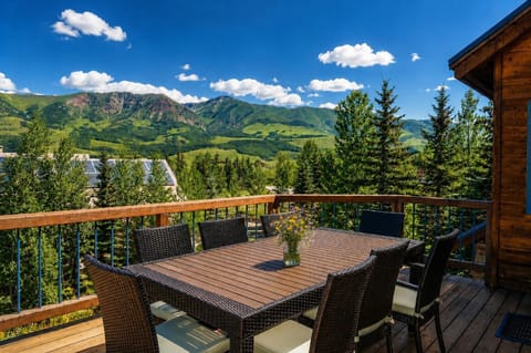 Summer mountain views from the spacious deck with outdoor dining