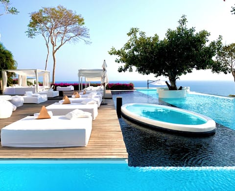 Outdoor pool, open 8:00 AM to 8:00 PM, pool umbrellas, sun loungers