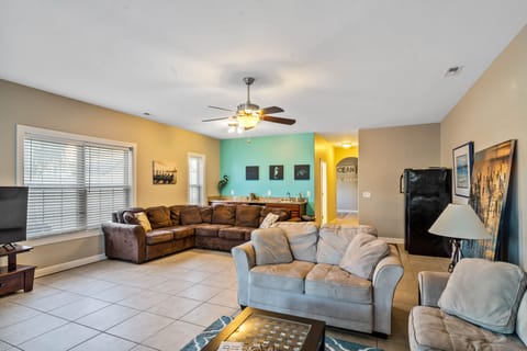 lower level great room with wet bar mini and full sized refrigerators