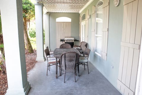 Porch view with gas grill & seating