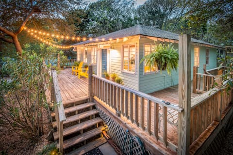 bistro lights and large deck for memorable outdoor moments 
