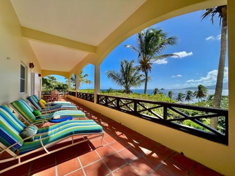 Private veranda with views overlooking the island of Nevis in back ground