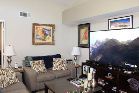 Livingroom with 65 inch 4K TV.