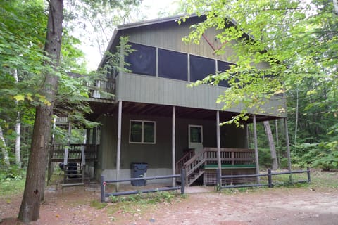 outside front, 1 minutes walk to shorefront and sandy beach with clubhouse