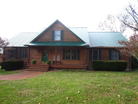A close up of our beautiful cedar house.
