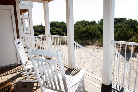 Downstairs deck, step right into the sand and a short walk to the water. 