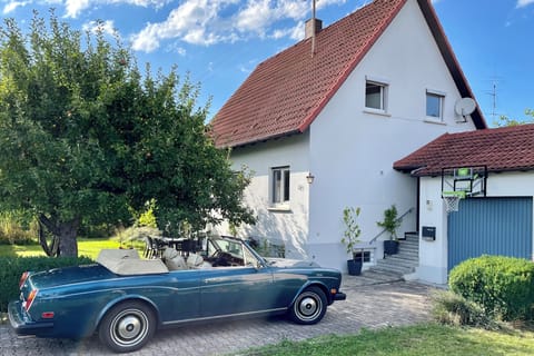 Private house surrounded by large garden + two parking spaces. Car not included.