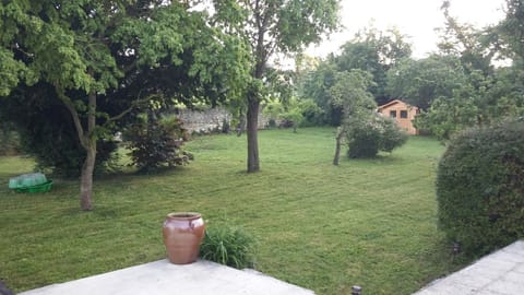 Gardens are peaceful and large; space to BBQ, relax, and play badminton or foot