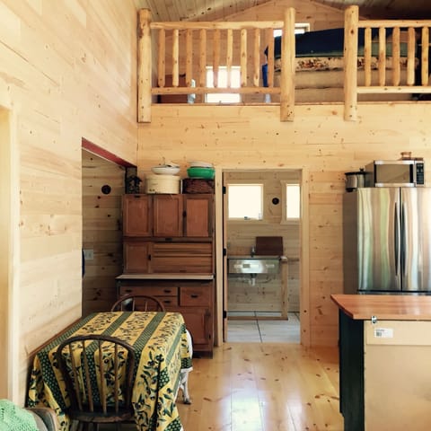 Kitchen looking into bathroom