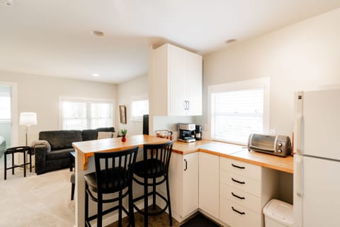 Northwest Side of Kitchen with Seating Overlooking Living Room