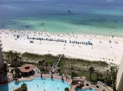 View of pool and beach from 18th floor condo private balcony