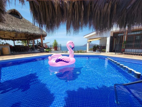 Pool with ocean views to Santiago Bay