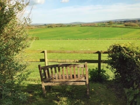 Back garden looks out onto a wonderful view of Dorset countryside