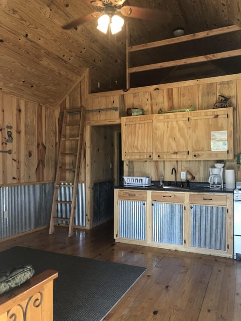 Kitchen - has pots, pans, dishes, utensils, etc.