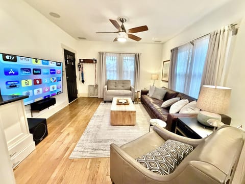 8 foot chocolate leather sofa and Loveseat sleeper sofa & 75” 4K UHD, 7.1 Denon