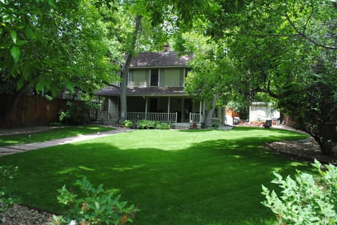 Great front lawn with large trees