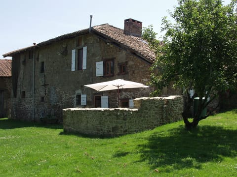 Rear of Gite showing garden, sitting area and BBQ