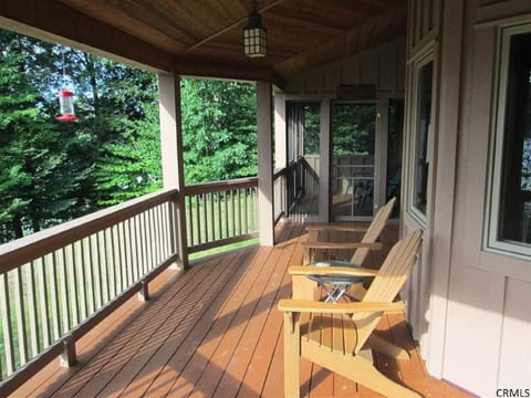 Wrap around porch with screened sitting area