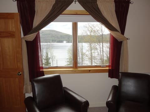 Master bedroom looking out over lake