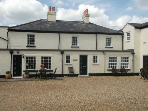 Whitehouse Cottage is to the left of the picture