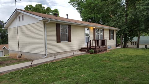 Huge front lawn and parking area.