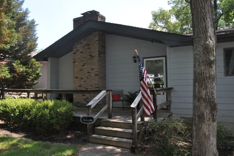 Front of the cottage.  A porch and sitting area is created to enjoy the wildlife