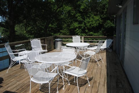 Upper deck runs the entire back of the cottage.  Gas grill is located here.