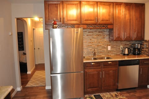 Gourmet Kitchen, fully stocked with high end Stainless Steel Appliances 