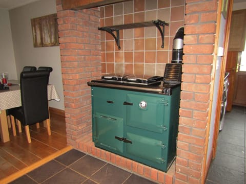 Oil fired Rayburn runs the hot water and central heating