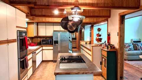 Fully equipped kitchen with stainless steel appliances
