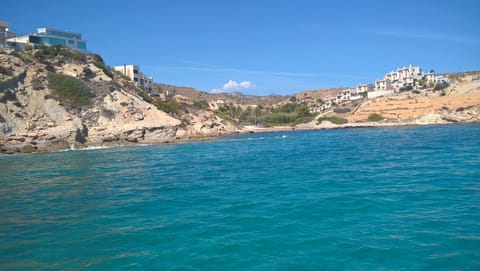 Looking from the boat to shore and Villa Sueño La Mar Residence